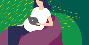 Pregnant mom reading ipad
